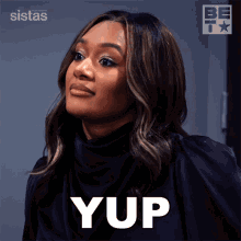 A Woman In A Black Shirt Is Saying Yup In White Letters GIF