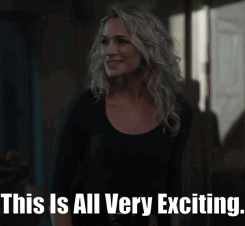 A Woman In A Black Shirt Is Smiling With The Words This Is All Very Exciting GIF