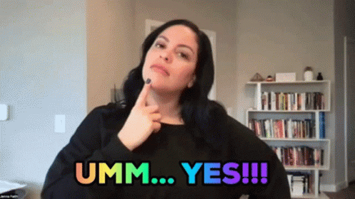 A Woman In A Black Shirt Says Umm Yes !!! GIF