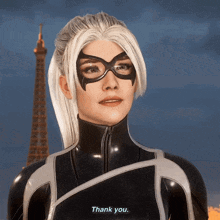 A Woman In A Black Suit And Mask Says Thank You GIF