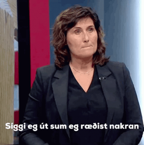 A Woman In A Black Suit Says Siggi Eg Ut Sum Eg Radist Nakran GIF