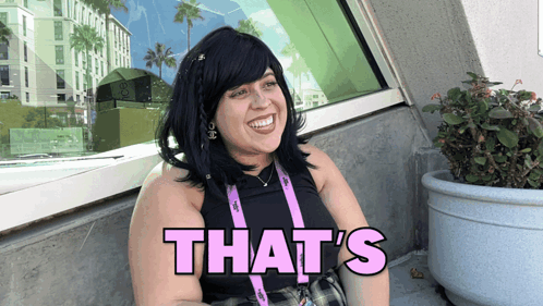 A Woman In A Black Tank Top Says That 'S GIF