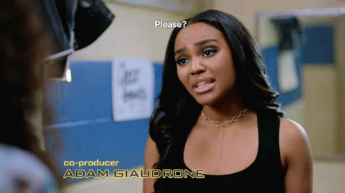 A Woman In A Black Tank Top With The Name Adam Giaudrone On The Bottom Right GIF