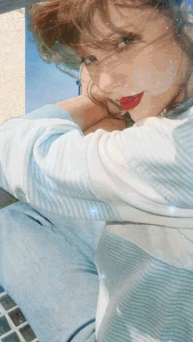 Woman In Blue And White Striped Shirt With Red Lipstick GIF