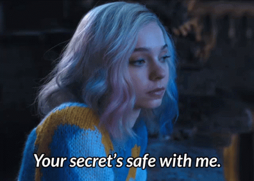 A Woman In A Blue And Yellow Sweater Says " Your Secret 'S Safe With Me " GIF