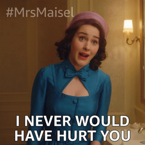 A Woman In A Blue Dress And A Pink Hat Says I Never Would Have Hurt You GIF