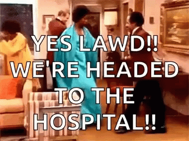 A Woman In A Blue Dress Is Dancing In A Living Room While A Man In A Suit Stands Behind Her . GIF
