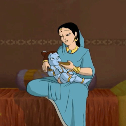 A Woman In A Blue Dress Is Holding A Baby GIF