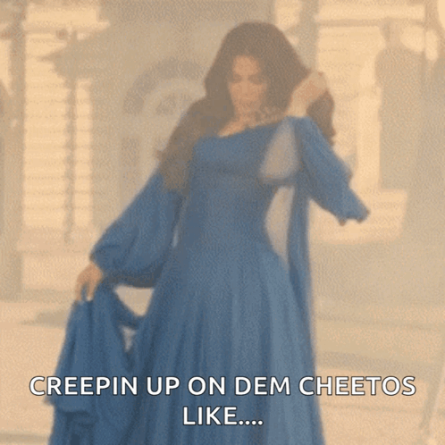 A Woman In A Blue Dress Says Creepin Up On Dem Cheetos Like ... GIF