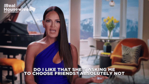A Woman In A Blue Dress Says Do I Like That She 'S Asking Me To Choose Friends ? Absolutely Not GIF