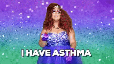 A Woman In A Blue Dress With A Tiara On Her Head Says I Have Asthma . GIF
