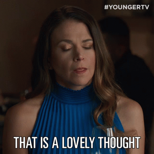 A Woman In A Blue Dress With The Words That Is A Lovely Thought GIF