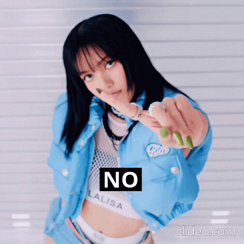A Woman In A Blue Jacket Is Pointing At The Camera With The Word No Written On It GIF