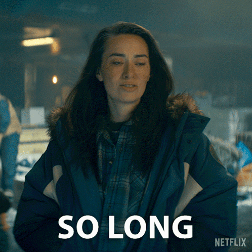 A Woman In A Blue Jacket Is Standing In Front Of A Sign That Says So Long By Netflix GIF