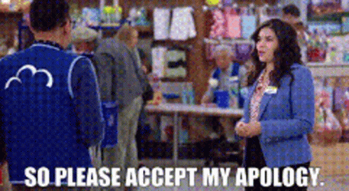 Woman In Blue Jacket Saying Please Accept My Apology GIF