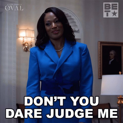 A Woman In A Blue Jacket Says " Don 'T You Dare Judge Me " GIF
