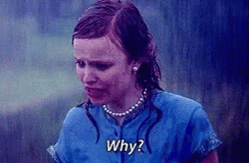 A Woman In A Blue Shirt Is Crying In The Rain And Asking Why ? GIF