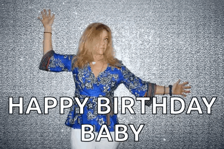 A Woman In A Blue Shirt Is Dancing With Her Arms Outstretched And The Words `` Happy Birthday Baby '' . GIF