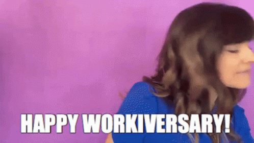 A Woman In A Blue Shirt Is Saying " Happy Workiversary " GIF
