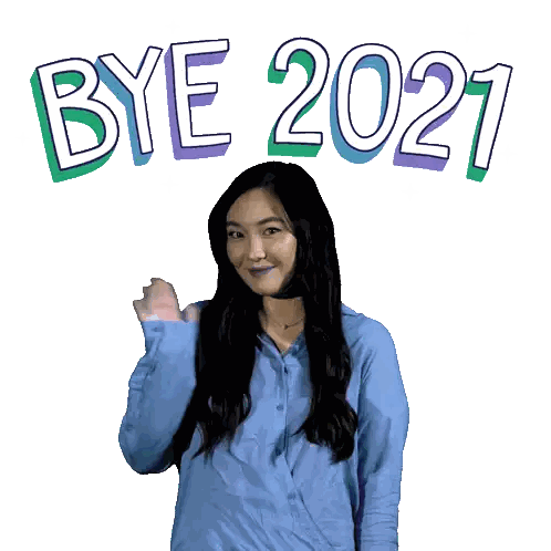 a woman in a blue shirt is waving her fist in front of the words bye 2021