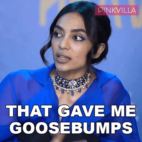 A Woman In A Blue Shirt Says That Gave Me Goosebumps In White Letters GIF