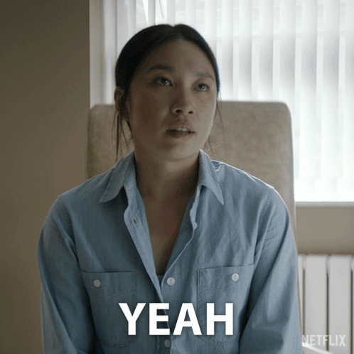 Woman In Blue Shirt Saying Yeah GIF