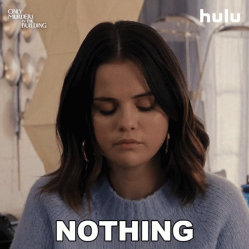 A Woman In A Blue Sweater Says Nothing In A Hulu Ad GIF