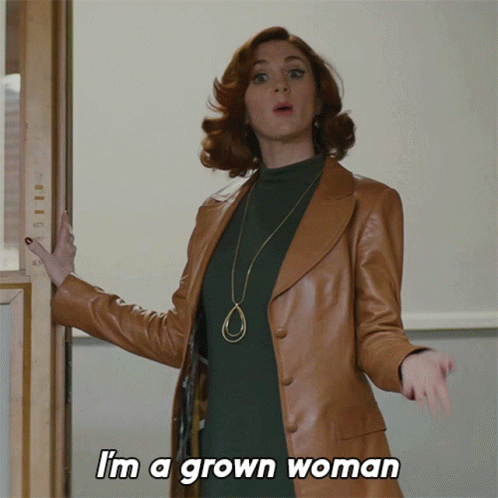 A Woman In A Brown Leather Coat Says " I 'M A Grown Woman " GIF