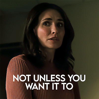 A Woman In A Brown Sweater With The Words " Not Unless You Want It To " Below Her GIF