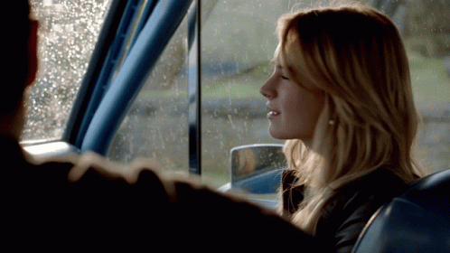 Woman Looking Out Car Window At Man GIF