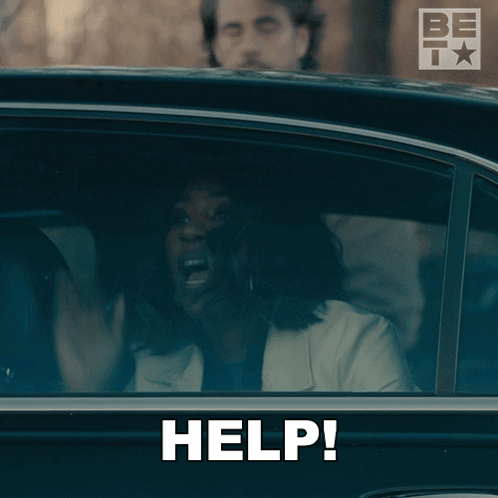 A Woman In A Car With Her Mouth Open And The Word Help Written On It GIF