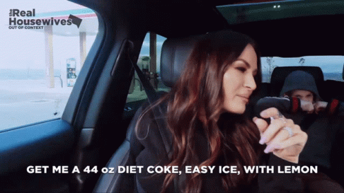 A Woman In A Car With The Words Get Me A 44 Oz Diet Coke Easy Ice With Lemon On The Bottom GIF