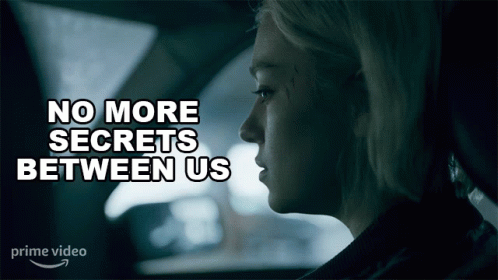 A Woman In A Car With The Words No More Secrets Between Us GIF