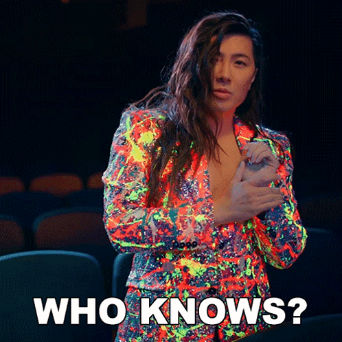 A Woman In A Colorful Jacket Is Asking Who Knows GIF