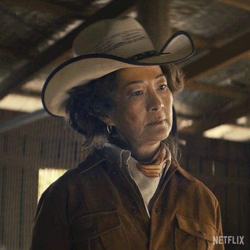A Woman In A Cowboy Hat Says Show Me How It Works On Netflix GIF