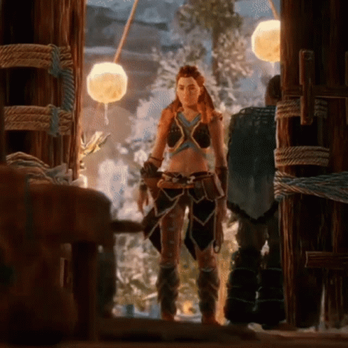 A Woman In A Crop Top Is Standing Next To A Man GIF