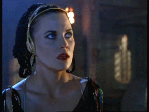 Woman In Dark Room Ares Written GIF