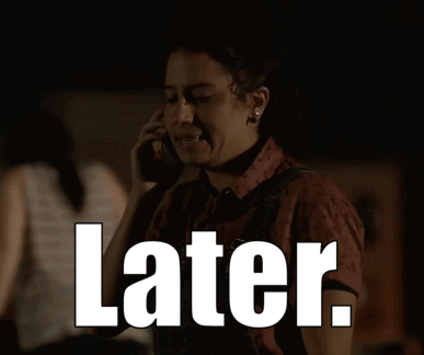 A Woman In A Dark Room With The Word Later On The Bottom Right GIF