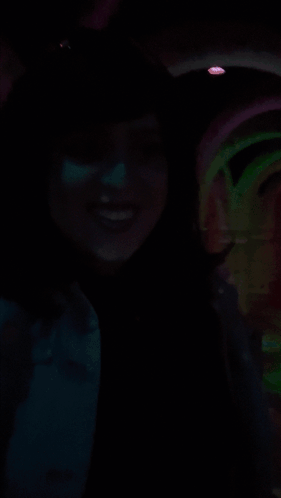 a woman in a dark room with the words no shagrita on the bottom right