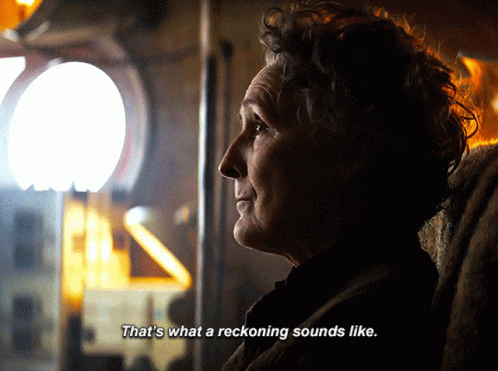 Woman In Dark Room With Reckoning Sounds GIF