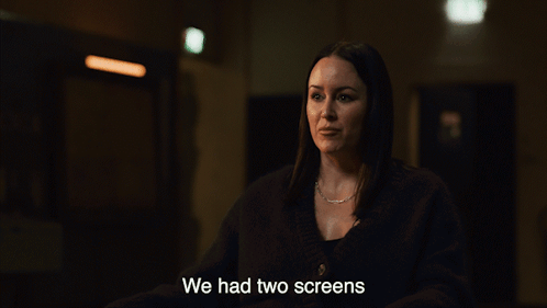 A Woman In A Dark Room With The Words We Had Two Screens Above Her GIF
