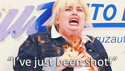 A Woman In A Denim Jacket Is Crying With The Words " I 'Ve Just Been Shot " On The Bottom GIF