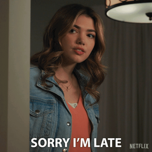 A Woman In A Denim Jacket Says Sorry I 'M Late In A Netflix Ad GIF