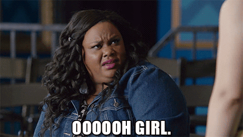 A Woman In A Denim Jacket With The Words Ooooh Girl On Her Face GIF