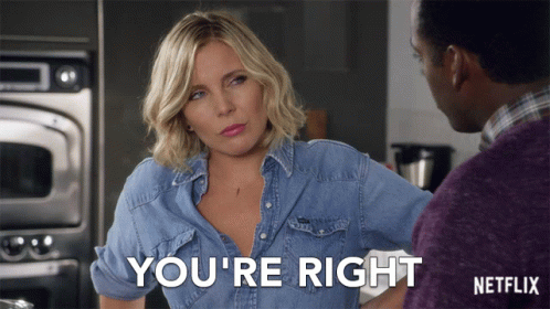 A Woman In A Denim Shirt Says " You 'Re Right " To A Man GIF