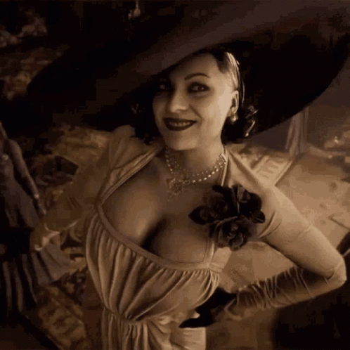 A Woman In A Dress And Hat Is Smiling And Looking At The Camera In A Black And White Photo . GIF