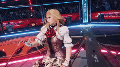 A Woman In A Dress Is Standing In A Boxing Ring With A Sign That Says Dominion GIF