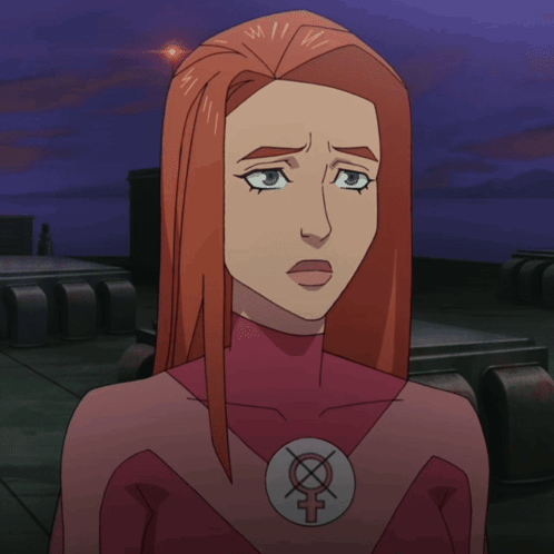 A Woman In A Female Superhero Costume Has A Female Symbol On Her Chest GIF