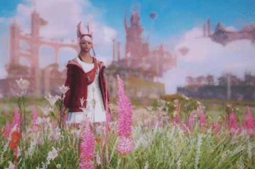 A Woman In A Field Of Flowers With Her Arms In The Air GIF