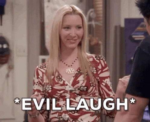 A Woman In A Floral Dress Is Smiling And Laughing While Standing Next To A Man . GIF